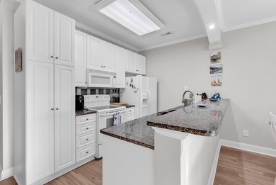 This furnished 3-bedroom, 2-bath coastal, condo residence is