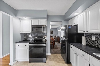 Brighton welcomes you home to this beautifully updated end-unit - photo 17
