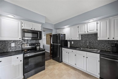 Brighton welcomes you home to this beautifully updated end-unit - photo 18
