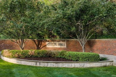 This all brick ranch over walkout basement in the prestigious - photo 2