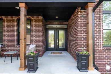 This all brick ranch over walkout basement in the prestigious - photo 10