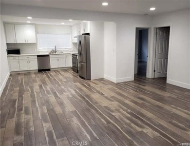 Experience refined coastal living in this elegantly updated - photo 2