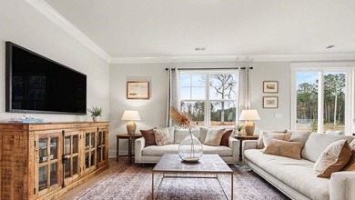 *4 bedrooms, 2.5 baths *Welcoming front porch and screened in - photo 4
