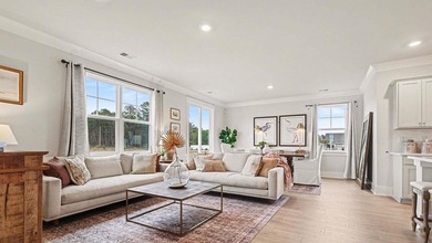 *4 bedrooms, 2.5 baths *Welcoming front porch and screened in - photo 6