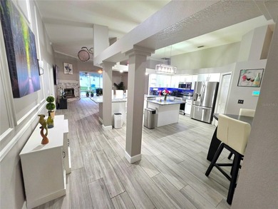 Welcome to this beautifully maintained pool home situated on an - photo 8