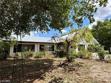 Welcome to 196 E Mariana Ave in North Fort Myers, a truly unique - photo 2