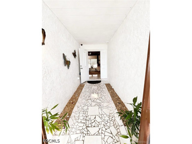 Welcome to 196 E Mariana Ave in North Fort Myers, a truly unique - photo 3