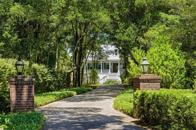 This elevated waterfront home with a private dock has been - photo 1