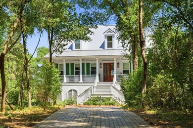 This elevated waterfront home with a private dock has been - photo 3