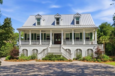 This elevated waterfront home with a private dock has been - photo 4