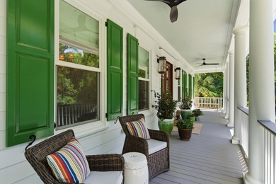 This elevated waterfront home with a private dock has been - photo 5