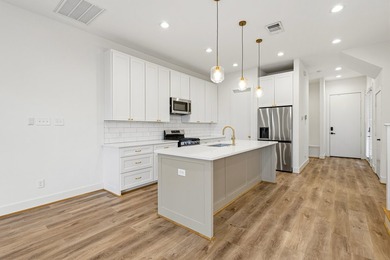 All offers welcome! This contemporary duplex offers a - photo 6