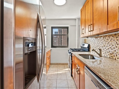 Welcome to this beautifully maintained two-bedroom apartment in - photo 8