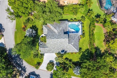 Set on an impressive 0.61-acre lot, this expansive and - photo 2