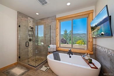 Perched high in prestigious Castle Glen Estates, this - photo 36