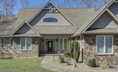 Experience lake living in this beautifully designed 4 bedroom, 3 - photo 2