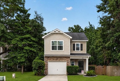 Nestled among mature trees on Johns Island, 1804 Towne Street - photo 1