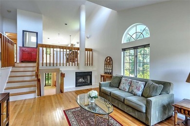 This well-maintained townhouse-style condominium is located in - photo 4
