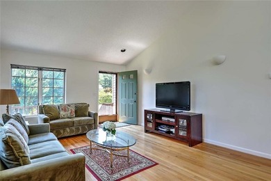 This well-maintained townhouse-style condominium is located in - photo 6