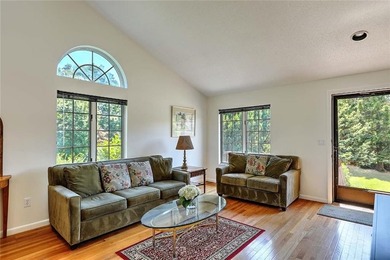 This well-maintained townhouse-style condominium is located in - photo 7