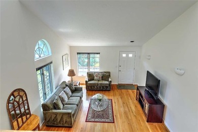 This well-maintained townhouse-style condominium is located in - photo 8
