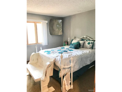 Updated 3rd-floor condo in Osage Vistas at Lake Ozark offering a - photo 11