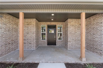 Take a look at this one-level new construction home located on a - photo 4