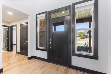 Take a look at this one-level new construction home located on a - photo 5