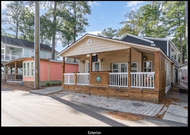 Cozy 2BR/2BA located within the prestigious and highly sought - photo 2