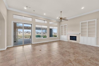 Ready to create your dream golf course retreat? This stucco and