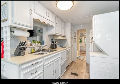 Cozy 2BR/2BA located within the prestigious and highly sought - photo 9