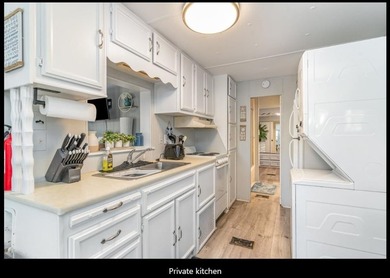Cozy 2BR/2BA located within the prestigious and highly sought - photo 10