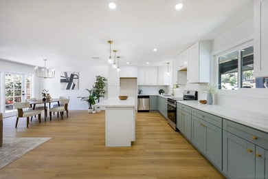 Beautifully renovated 4 bedroom, 3 full bathroom home in the - photo 8