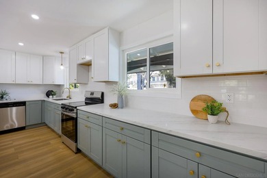 Beautifully renovated 4 bedroom, 3 full bathroom home in the - photo 10