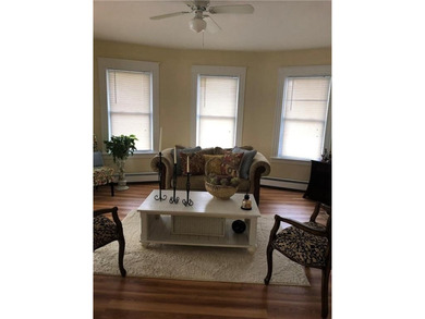 Welcome to this well-maintained 3 family home + 2 car garage - photo 3