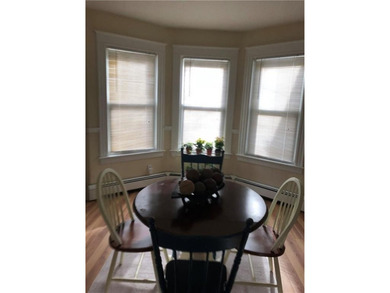 Welcome to this well-maintained 3 family home + 2 car garage - photo 8