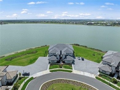 Absolutely stunning coach home on a peninsula lot with expansive - photo 1
