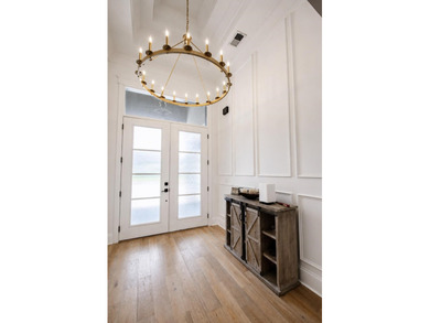 Luxurious 4-bedroom, 3.5-bath single-level stucco home situated - photo 5