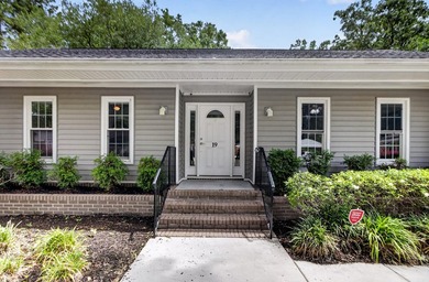 Welcome home to this beautifully updated property located in the - photo 4
