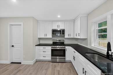 Welcome to 245 Cedar Avenue-a beautifully restored Colonial - photo 10