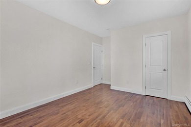 Move right into this renovated, legal two-family, Colonial-style - photo 11