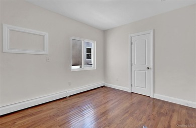 Move right into this renovated, legal two-family, Colonial-style - photo 12