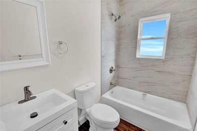 Move right into this renovated, legal two-family, Colonial-style - photo 13