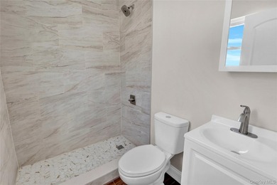 Move right into this renovated, legal two-family, Colonial-style - photo 14