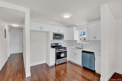 Move right into this renovated, legal two-family, Colonial-style - photo 17