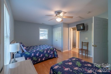 Situated along the shoreline of Badin Lake, this one-of-a-kind - photo 25