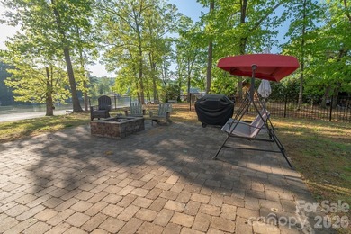Situated along the shoreline of Badin Lake, this one-of-a-kind - photo 34