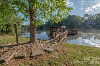 Situated along the shoreline of Badin Lake, this one-of-a-kind - photo 36