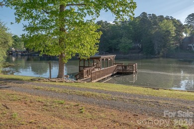 Situated along the shoreline of Badin Lake, this one-of-a-kind - photo 37