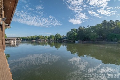 Situated along the shoreline of Badin Lake, this one-of-a-kind - photo 41